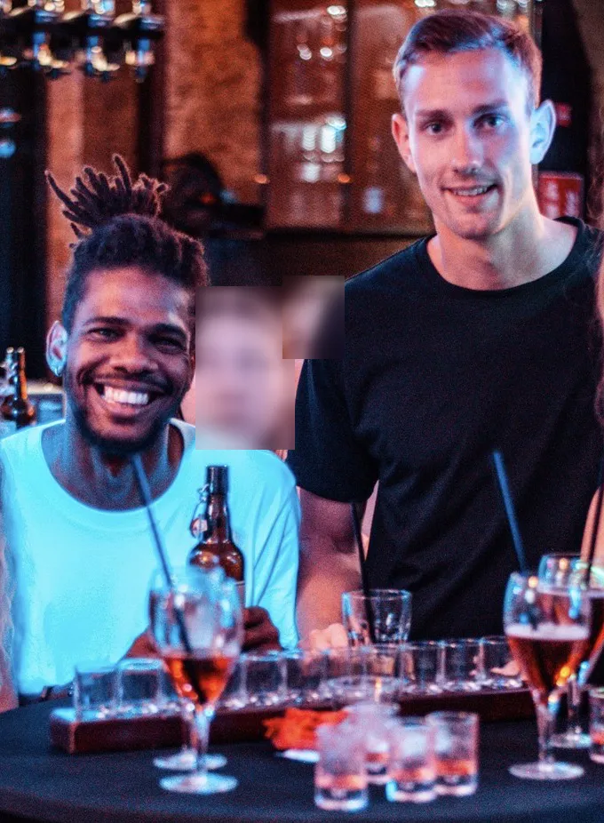 Patrick and his Buddy, together again in Vienna, around a table of drinks